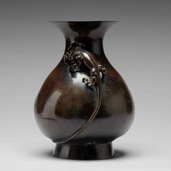 703. A bronze vase, presumably 18th Century.