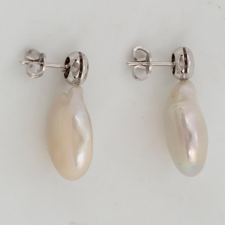 Cultured freshwater pearl and diamond earrings.