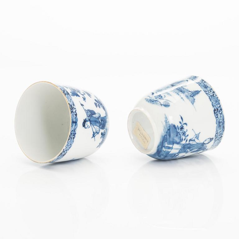 A set of two blue and white 'Chinese Export' tea caddies and four cups with saucers, Qing dynasty, 18th Century.