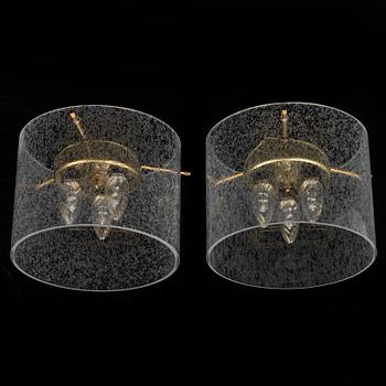 A pair of late 20th Century ceiling light by Kjell Munch.