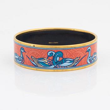 Hermès, a goldplated and enamel duck bangle.