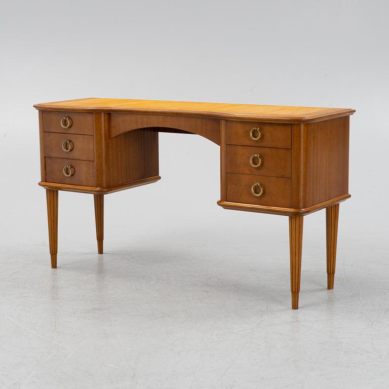 A Swedish Modern table, mid 20th Century.