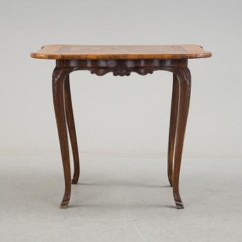 A mid 18th century rococo table.