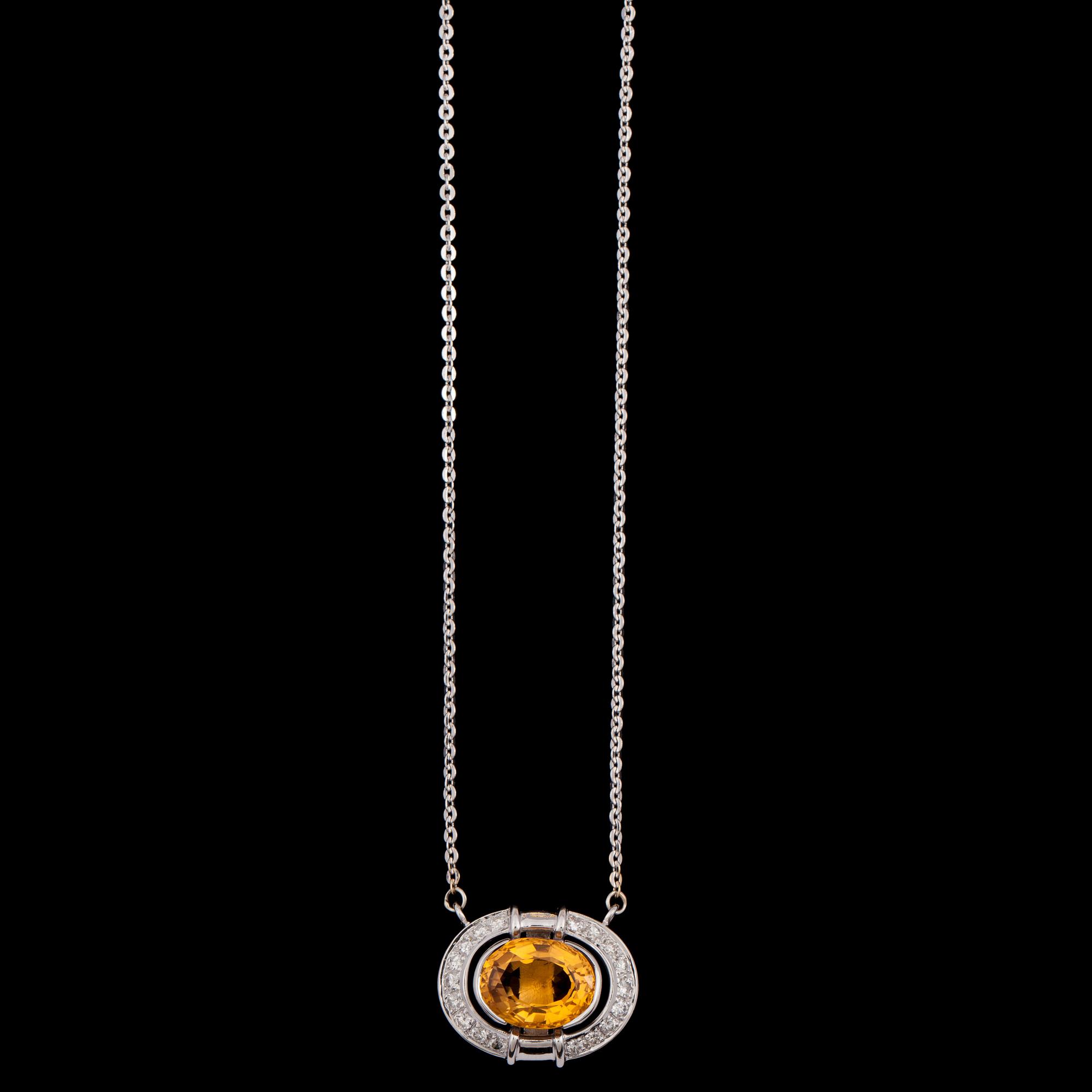 HÄNGE, 18k vitguld med fasettslipad citrin och  briljantslipade diamanter, totalt 0.72 ct. Vikt 12 g.