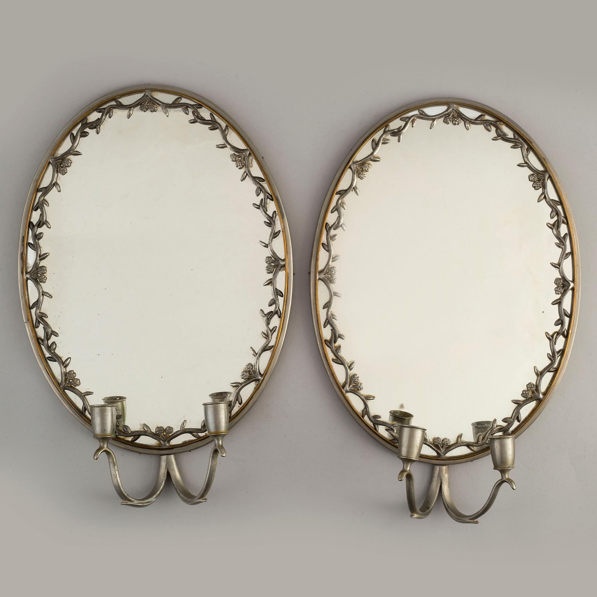 A pair of pewter wall sconces, Firma Svenskt Tenn, model no 245, Stockholm 1928.