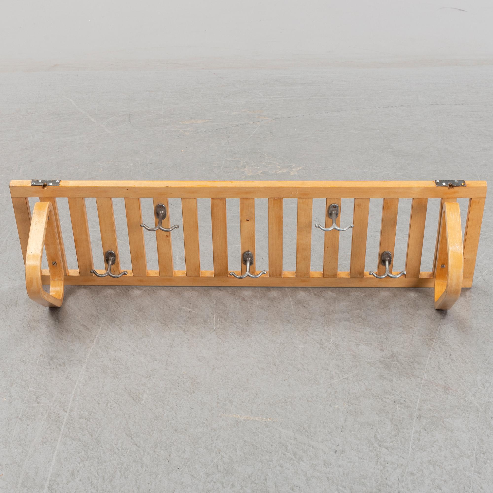 A mid 20th century Alvar Aalto shelf.