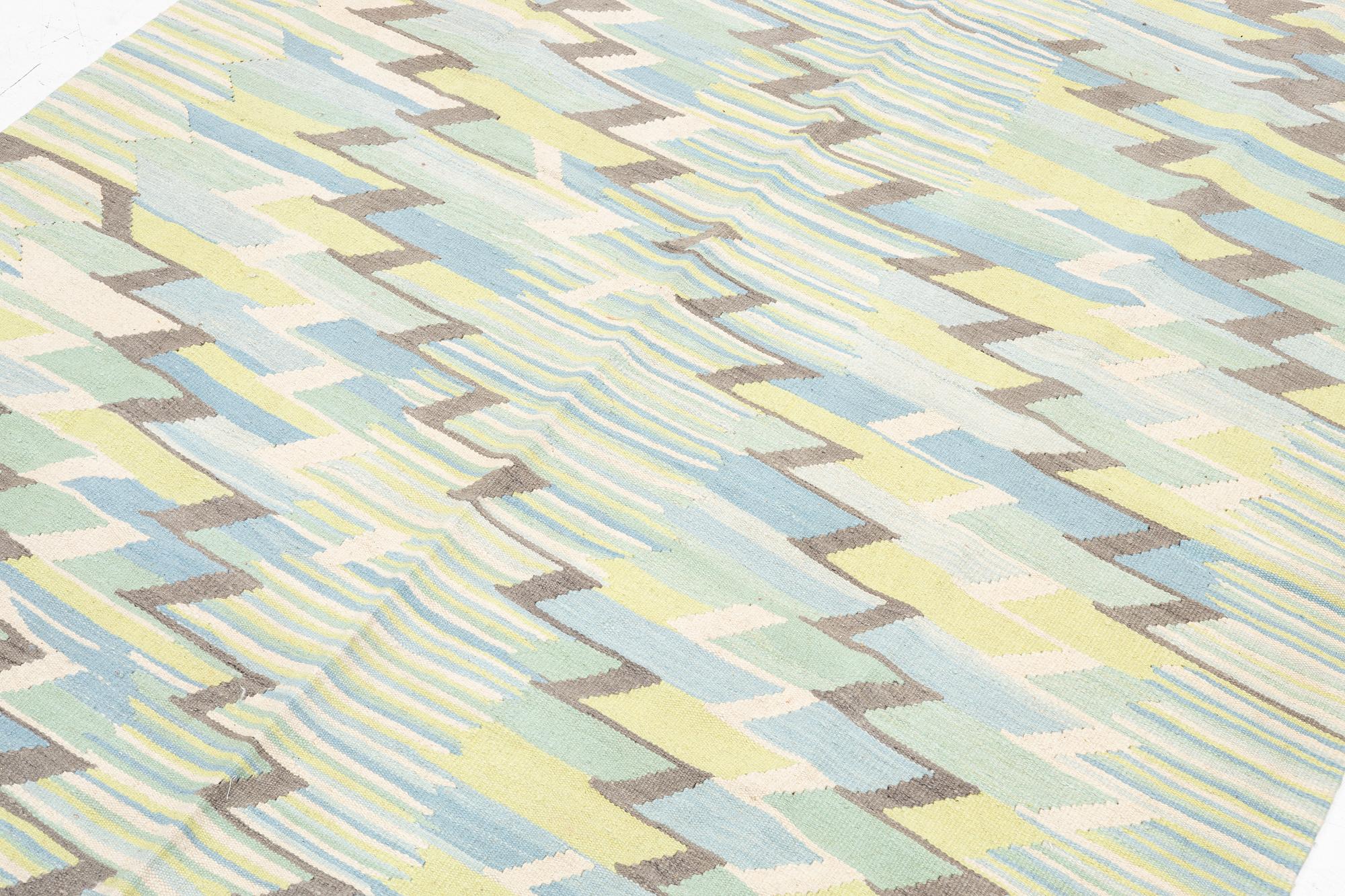 A Kelim carpet, c. 257 x 193 cm.
