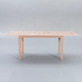 A Danish 1960s dining table and 6 chairs,