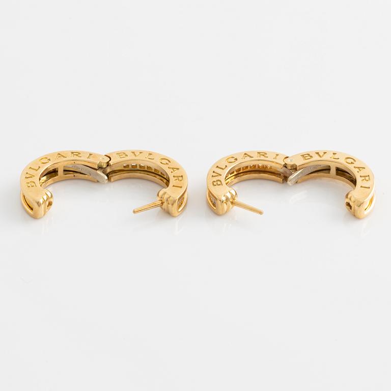 Bulgari a pair of earrings "B.zero 1" in 18K gold with round brilliant-cut diamonds.