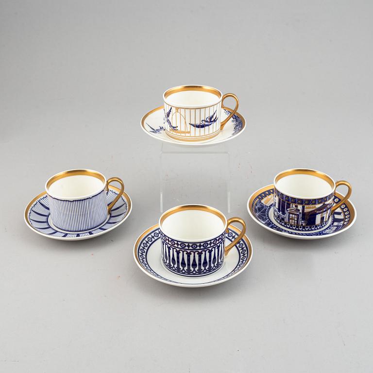 A 24 pcs bone china service from Flux Stoke on Trent, different motives and designers, designed in 2012. England.