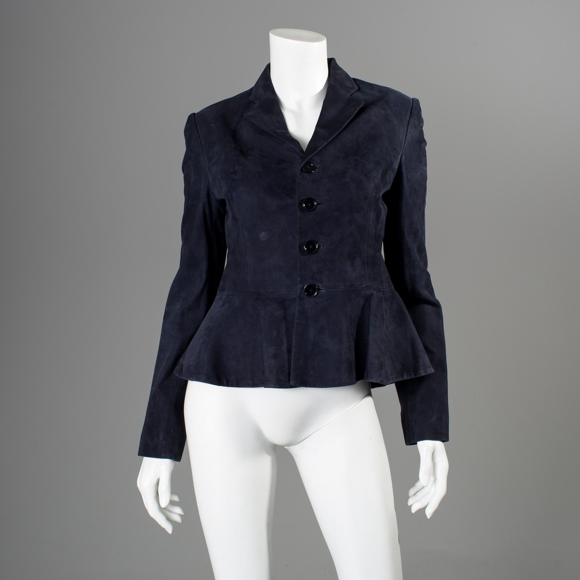 A darkblue suede jacket by Ralph Lauren.