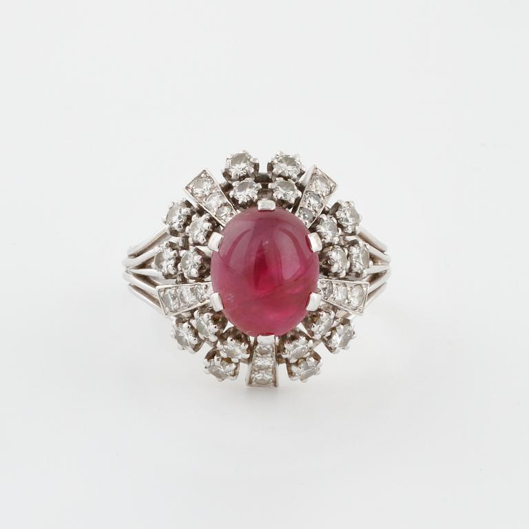 A star ruby and brilliant cut diamond ring by WA Bolin, Stockholm, 1971.