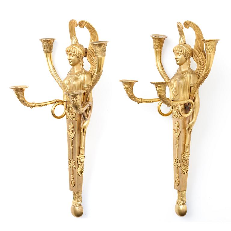 APPLIQUER, ett par, för fyra ljus, Frankrike ca 1810, Empire.