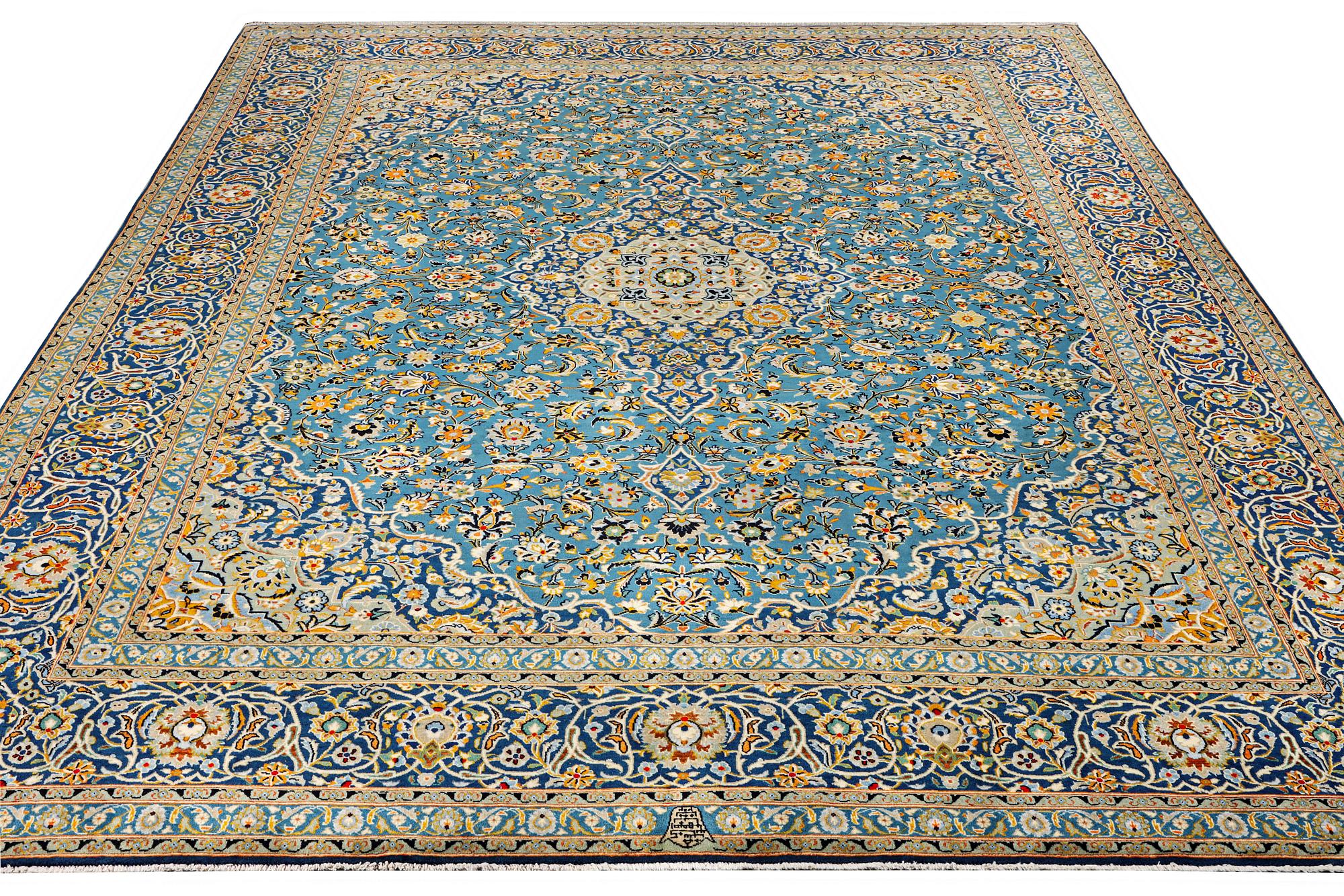 A Kashan carpet, signed Isfahanian, a. 407 x 310 cm.