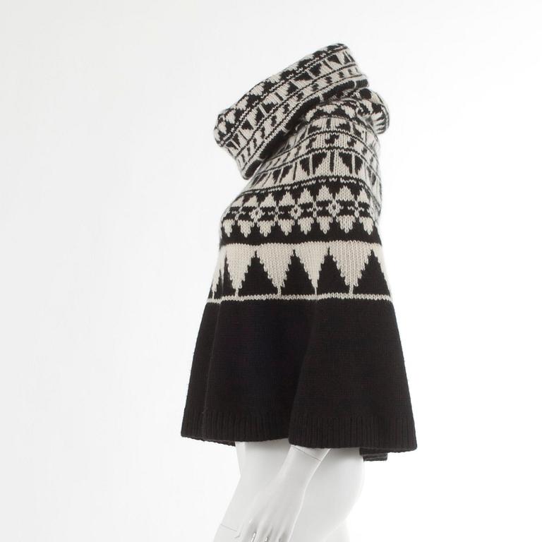 RALPH LAUREN, a black and white chasmere and mohair poncho. Size M/L.