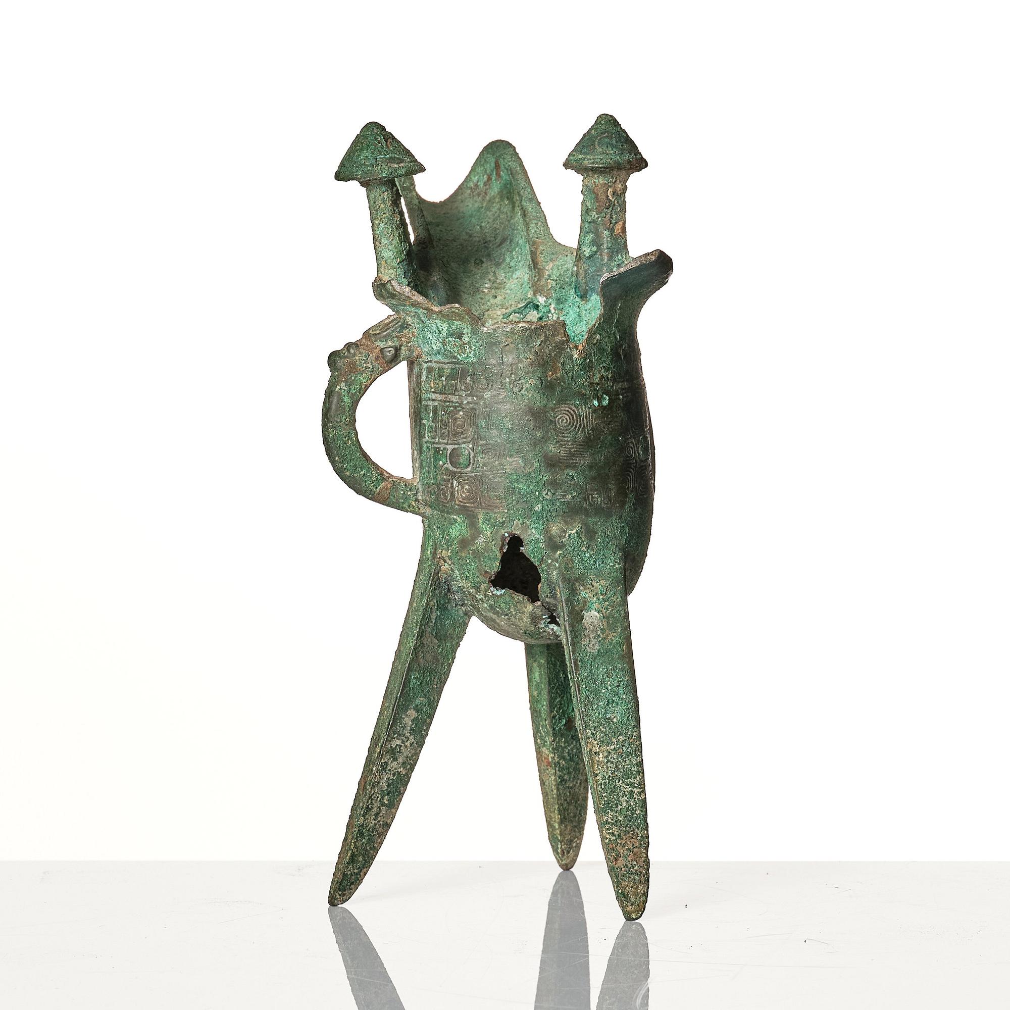 A bronze ritual wine vessel, jue and a bowl, possibly Shang and Ming dynasty.
