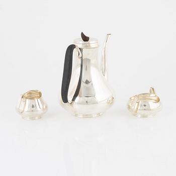 A Danish Sterling Silver Coffee Pot, Creamer and Sugar Bowl, mark of Svend Toxvaerd, circa mid-20th century.