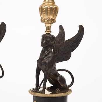 A pair of Russian Louis XVI-style 19th century five-light candelabra.