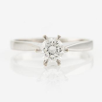 An 18K white gold ring set with a round brilliant-cut diamond 0.53 ct TW/if according to engraving.