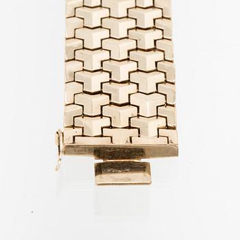 A 14K gold bracelet.