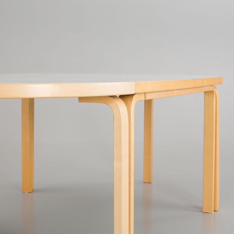 A SET OF 3 PARTS ALVAR AALTO DINING TABLE FROM ARTEK.
