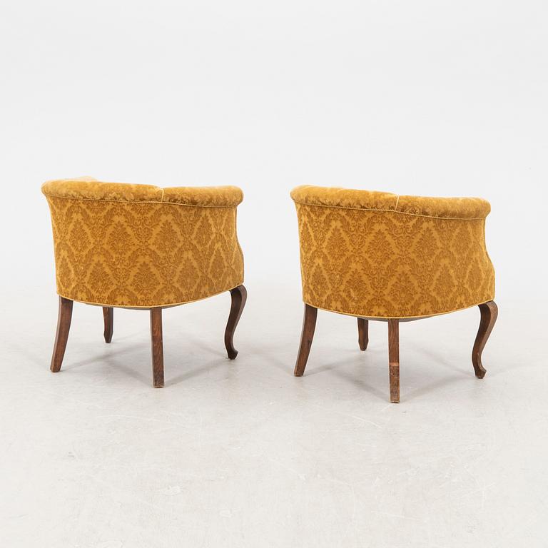 A pair of 1930/40s armchairs.