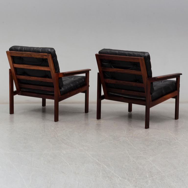 A pair of 'Capella' rosewood easy chairs by Illum Wikkelsø.