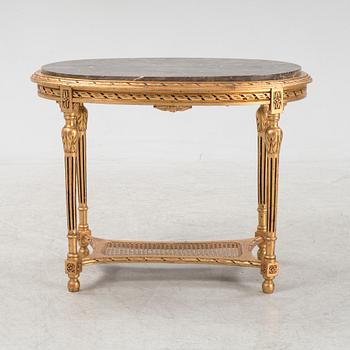 A Louis XVI style table, 20th Century.