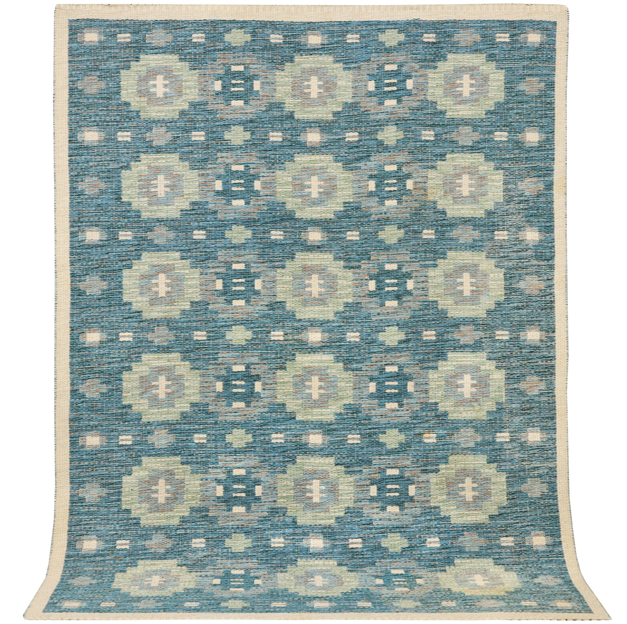 A flat weave rug, a. 196 x 141 cm.