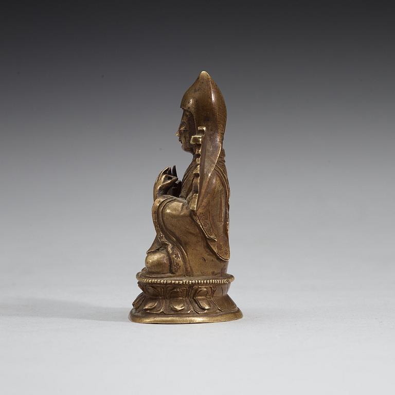 A seated bronze figure of Tsong Khapa, Tibet, 19th Century.