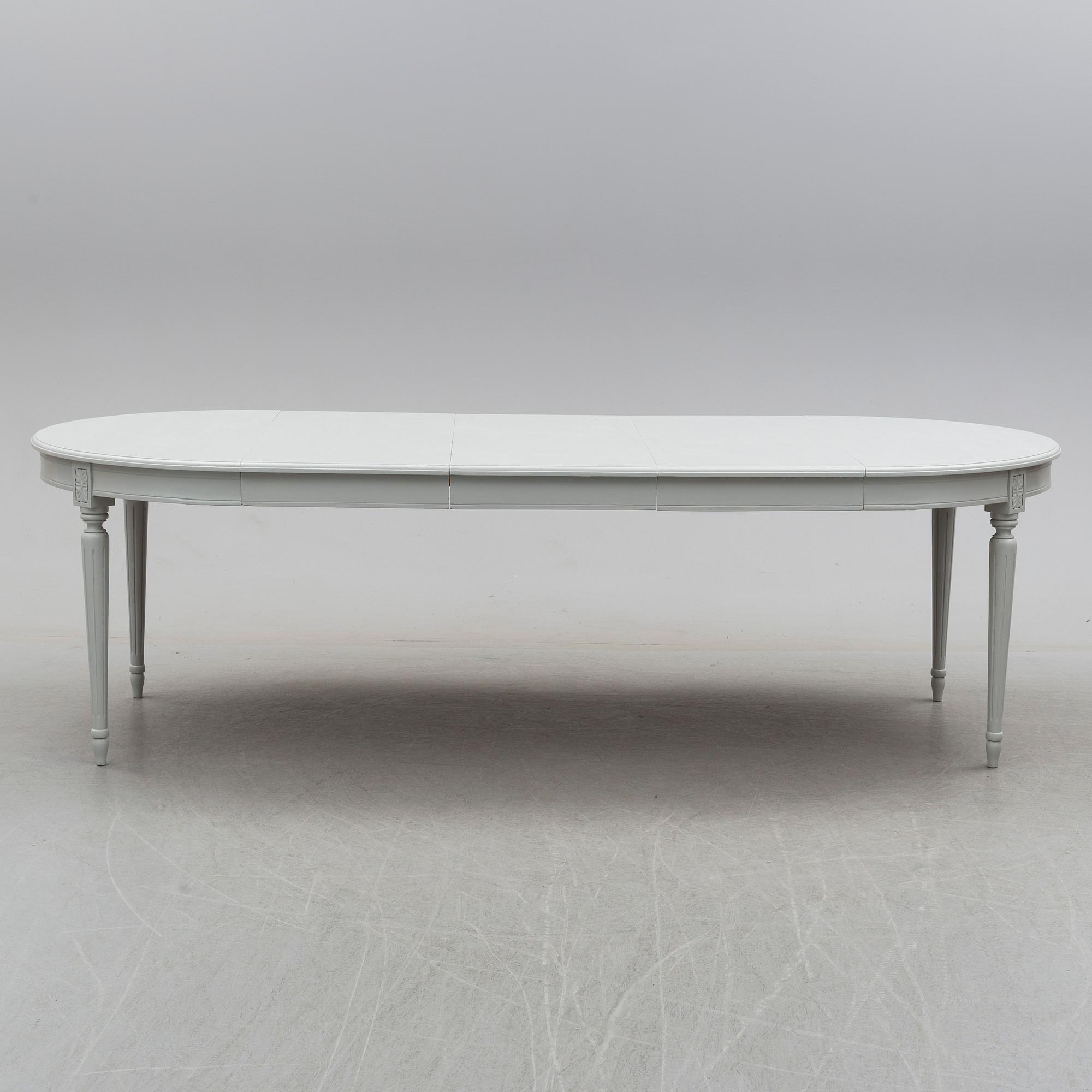 A second half of the 20th century Gustavian style dining table.