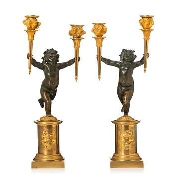 142. A pair of Louis XVI candelabra.