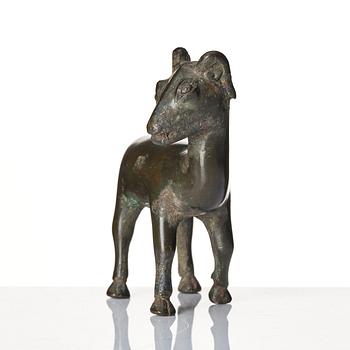 A group of four bronze figures, Ming dynasty and older.