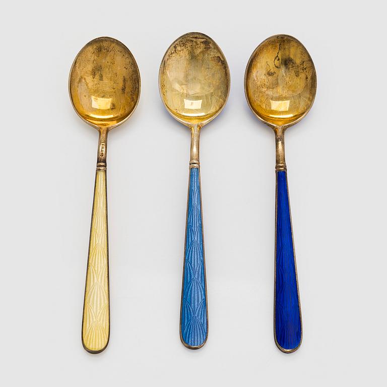 Tillander, a 10-piece set of enamelled and gilt silver coffee spoons, Helsinki.