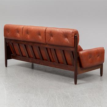 A 1960's/70's three-piece furniture suite.