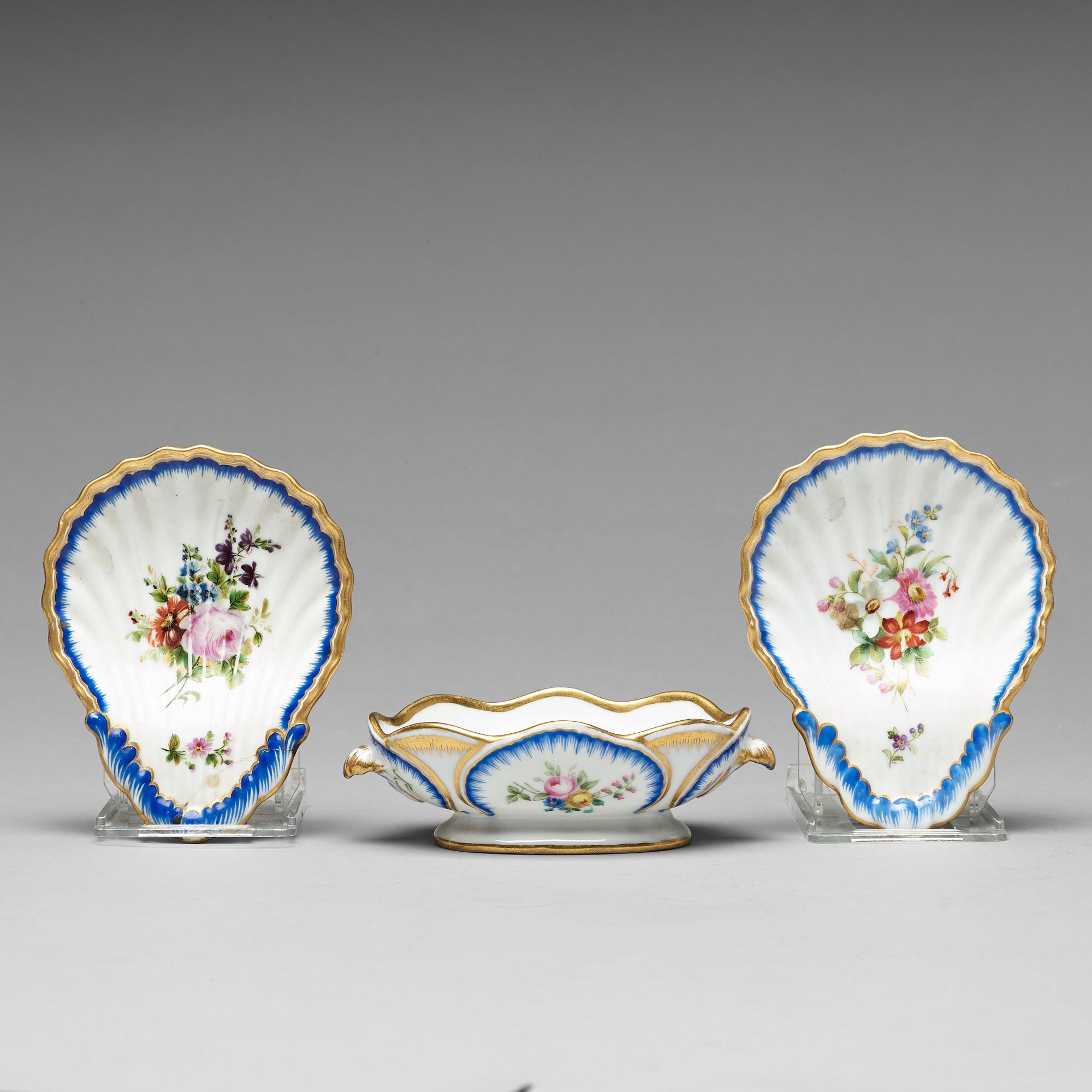 Two butter shells and a salt, Imperial Porcelain Manufacture, St. Petersburg, Russia, period of Czar Nicholas II.