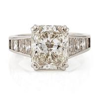 A ring in platinum with a radiant-cut diamond.