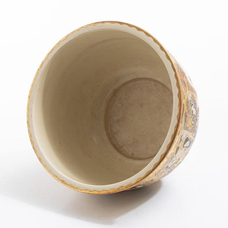 A Japanese satsuma figural flower pot, early 20th century.