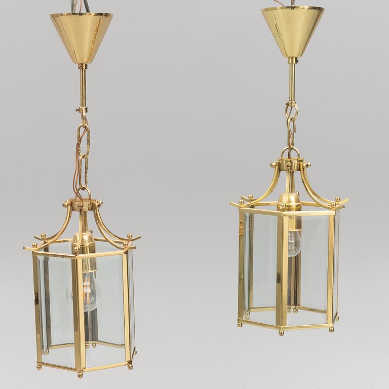 A pair of ceiling lights, later part of the 20th Century.