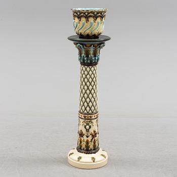 An end of the 19th century maiolica pedestal by Rörstrand.