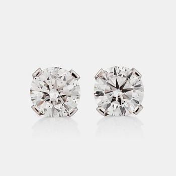 691. A pair of diamond stud earrings. Total carat weight circa 4.00 ct. Quality approximately F-G/SI.