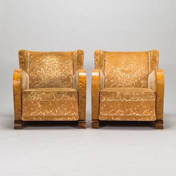 A pair of 1930's armchairs.