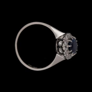 A blue sapphire ring, 1.23 ct, set with brilliant cut diamonds, 0.42 ct.