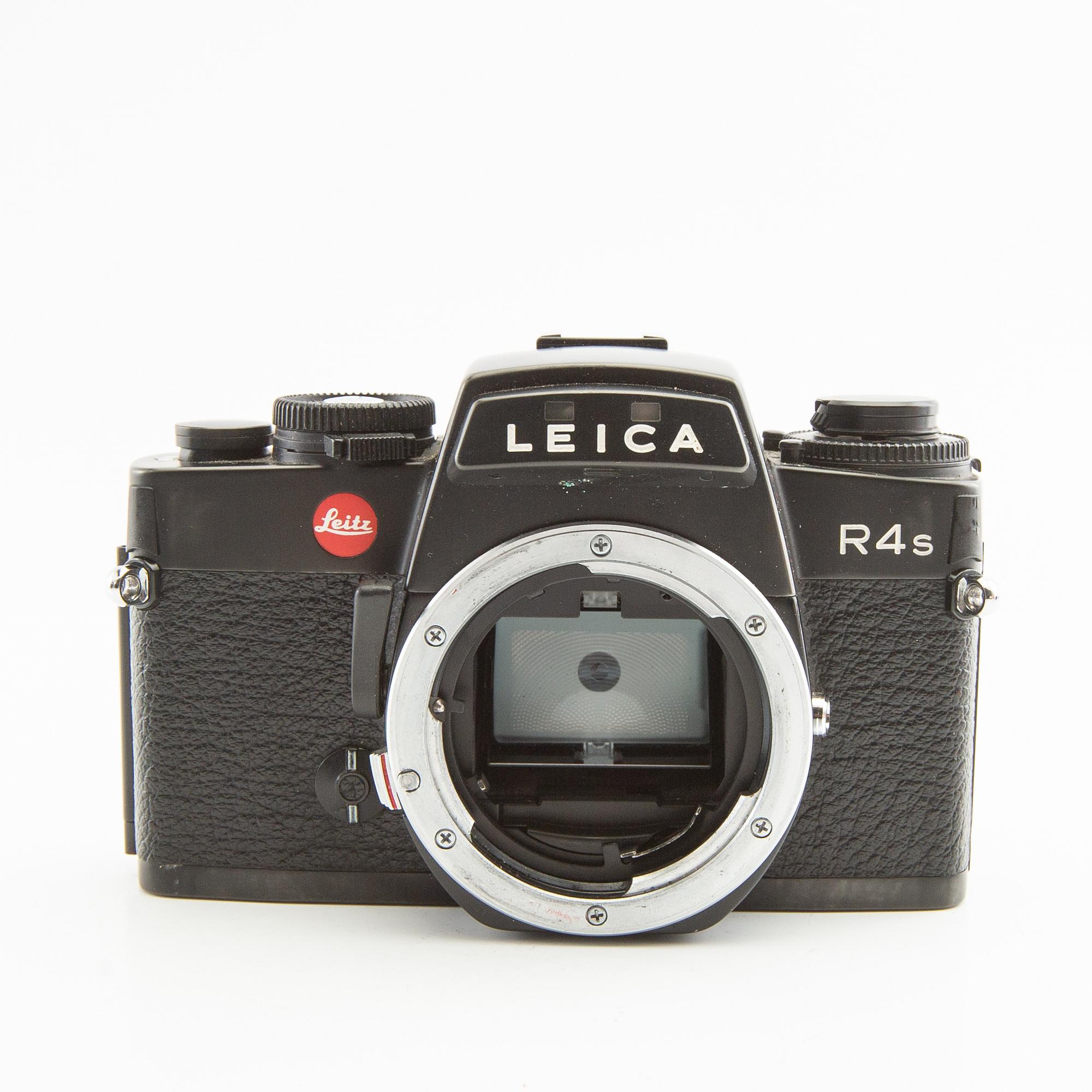 Leica R4s camera body, lens, and accessories.