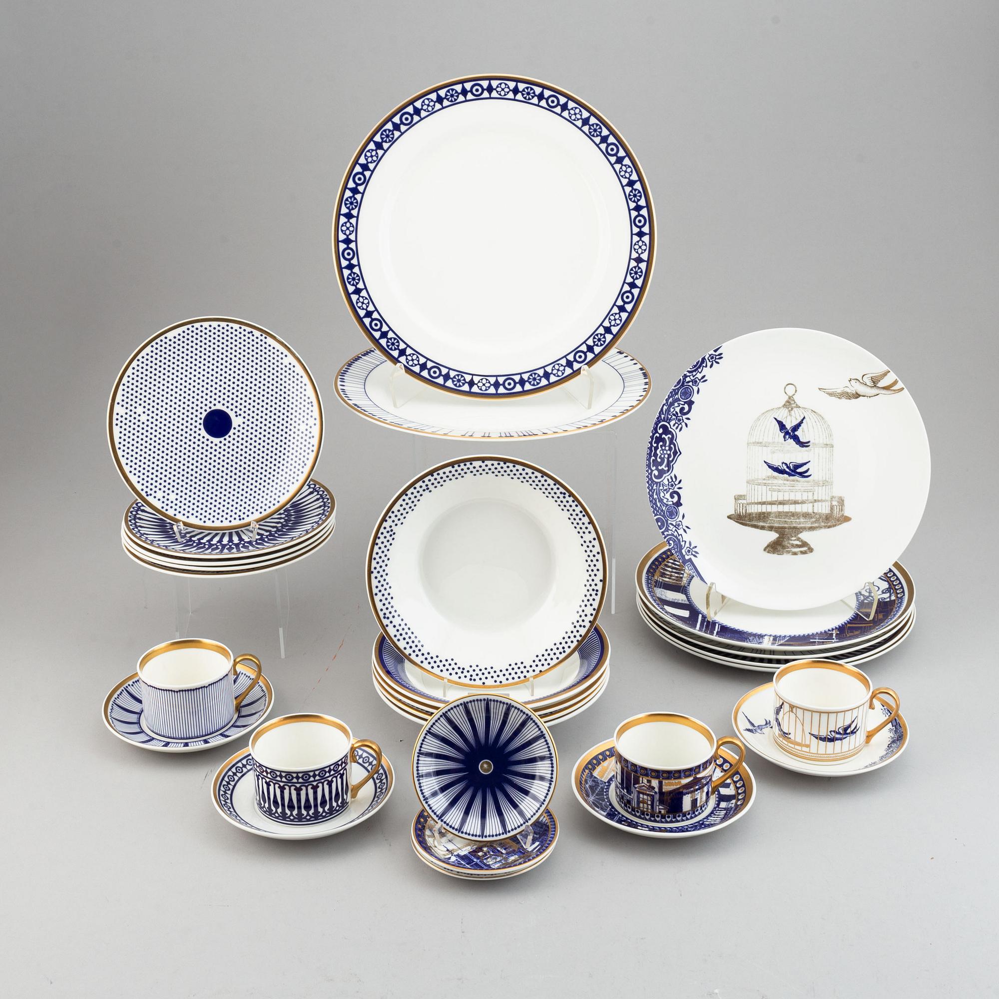 A 24 pcs bone china service from Flux Stoke on Trent, different motives and designers, designed in 2012. England.