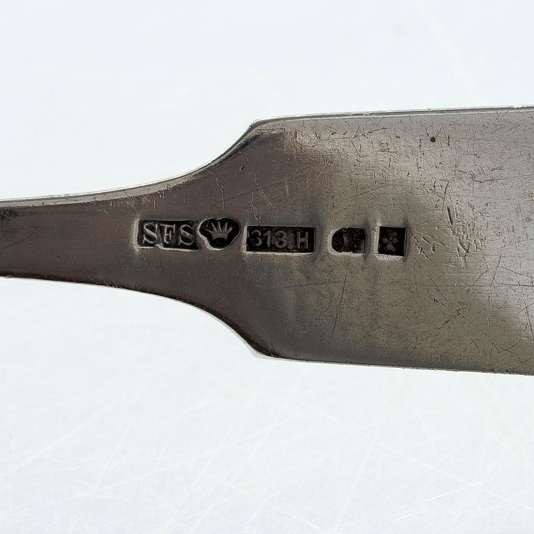 A pair of Russian silver salt cellars, a sprinkle spoon, a sauce ladle, and a tea strainer, Finnish marks.