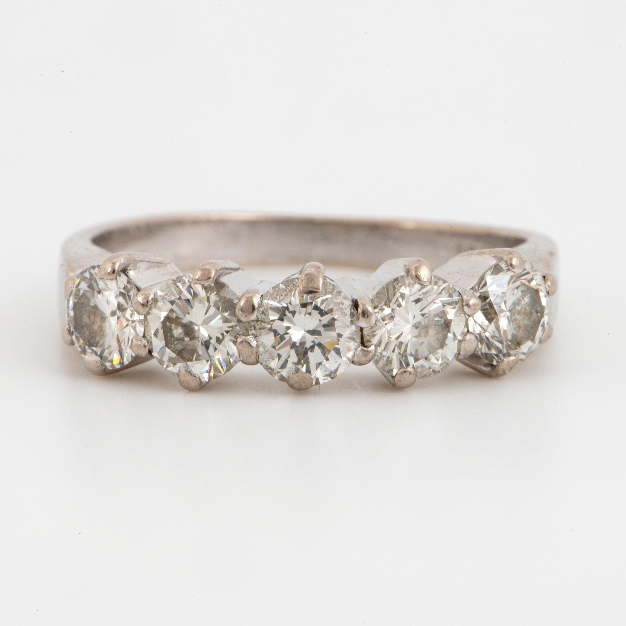 Round brilliant-cut diamond ring.
