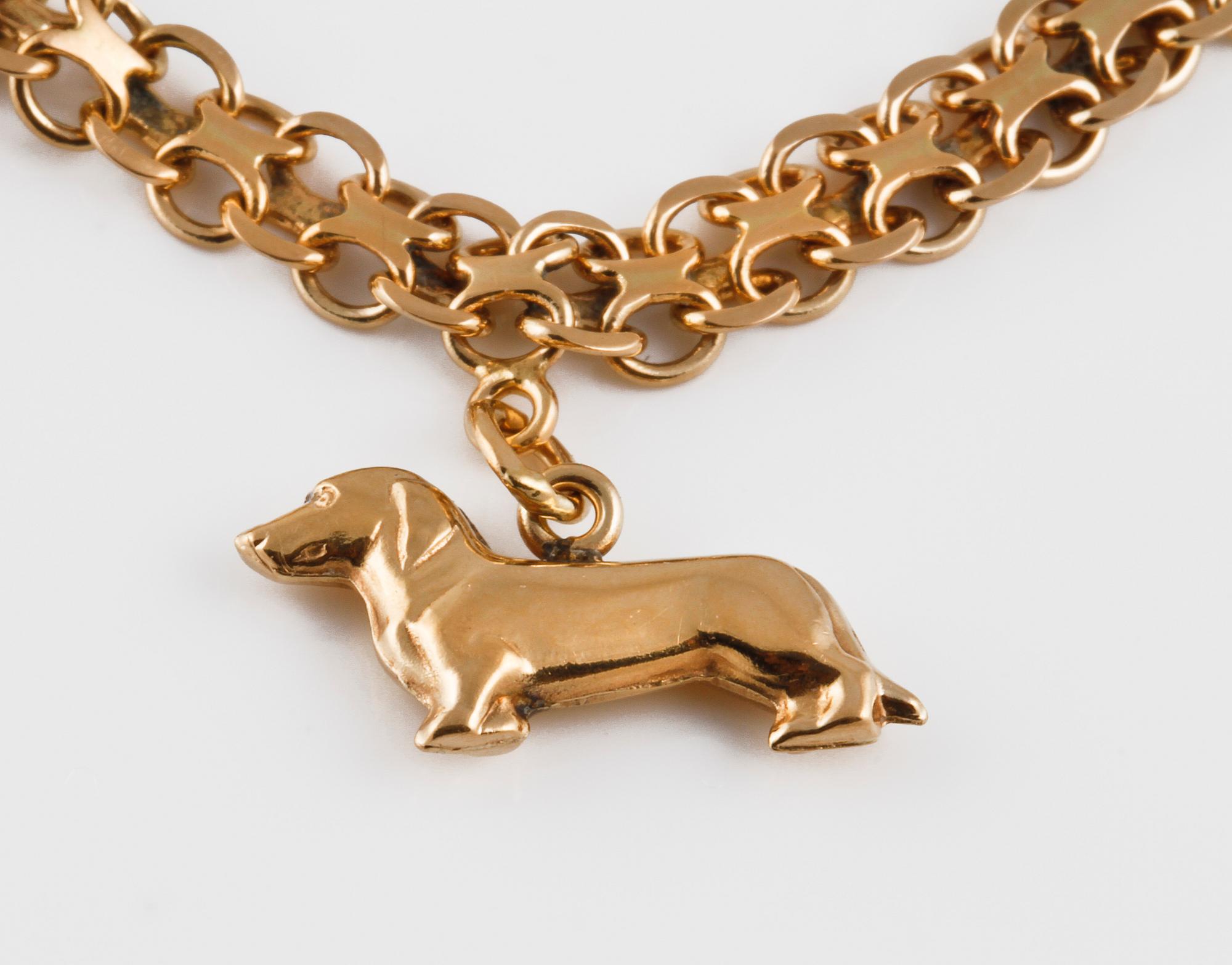 ARMBAND med 2 BERLOCKER, 18K guld, Bröderna Heden, Stockholm, 1969. Vikt 9,6 gram.