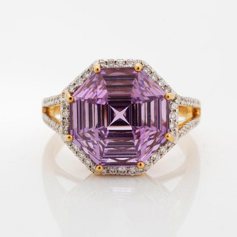 An amethyst ring.