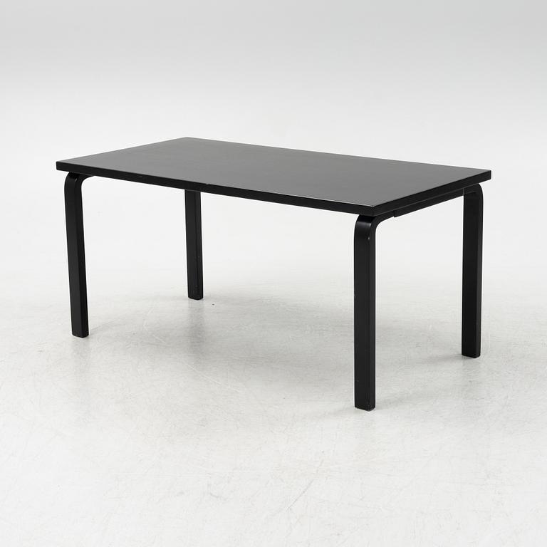 Alvar Aalto, a dining table and eight chairs, model 69, Artek, Finland, end of the 20th century.